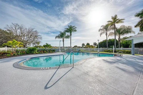 a view of a house with swimming pool