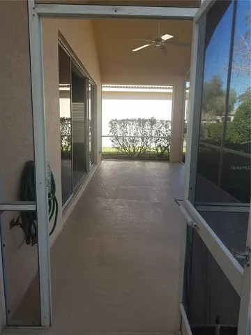 a kitchen with stainless steel appliances granite countertop a refrigerator and a stove