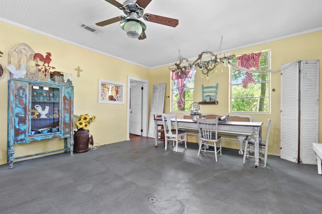 1355 North Houston Street Lorena, TX 76655 - Photo 19 of 40 a view of a dining room with furniture window and chandelier