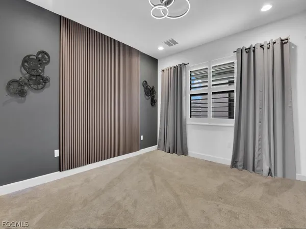 a view of a livingroom with a staircase