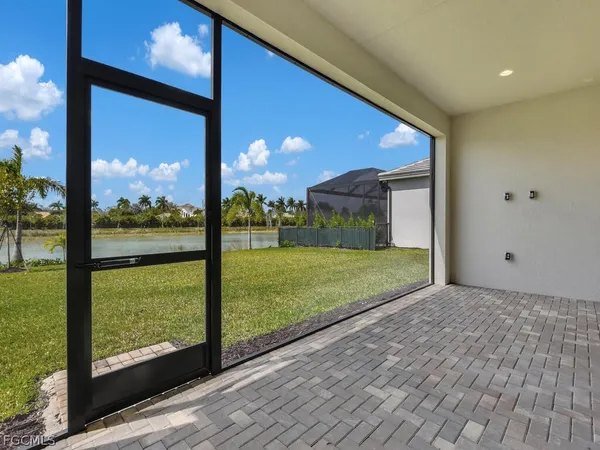 a view of a porch and a yard