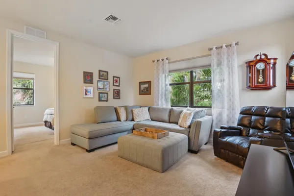 a living room with furniture and a window