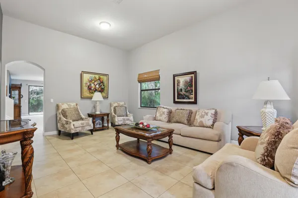 a living room with furniture and a couch