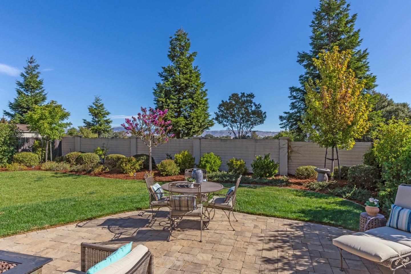 5602 Mesa Road Gilroy, CA 95020 - Photo 20 of 23 a view of a chair and table in backyard of the house