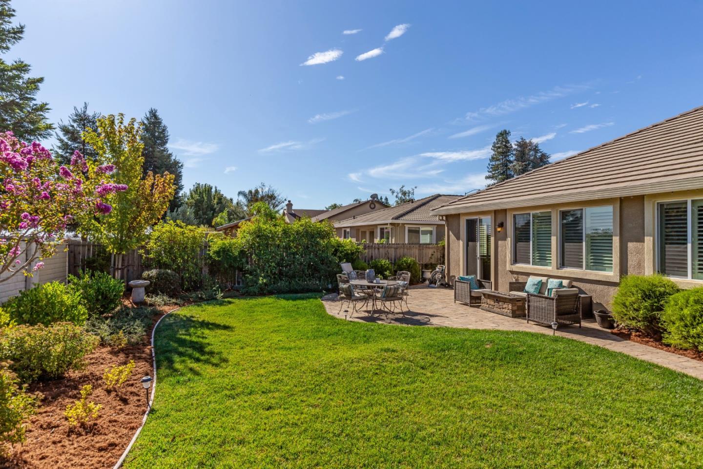 5602 Mesa Road Gilroy, CA 95020 - Photo 23 of 23 a view of a house with backyard porch and sitting area