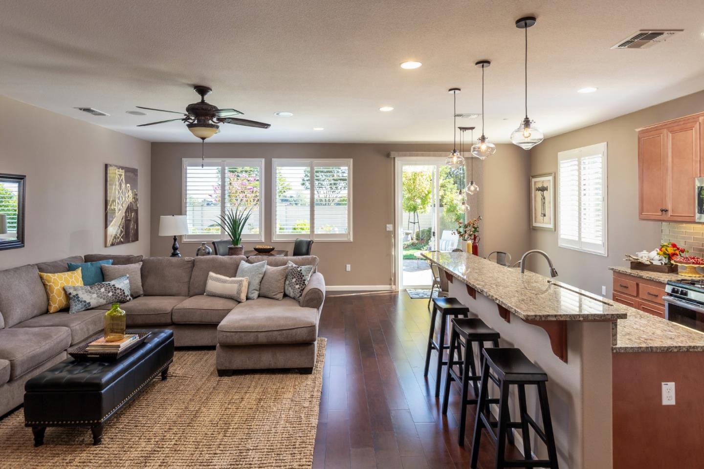 5602 Mesa Road Gilroy, CA 95020 - Photo 6 of 23 a living room with furniture a ceiling fan and a window