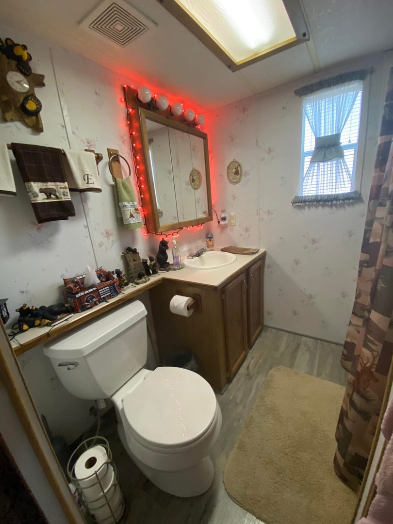 2795 East 28th Road Marseilles, IL 61341 - Photo 24 of 35 a bathroom with a sink toilet and mirror