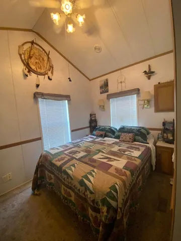 a view of a chairs and tables in patio