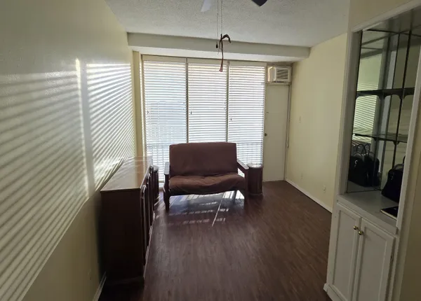 a utility room with cabinets washer and dryer