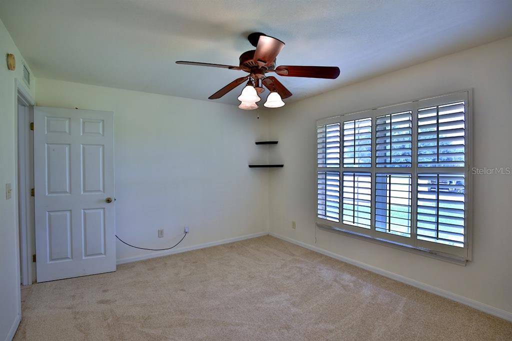 12219 Southwest 26th Street Ocala, FL 34481 - Photo 15 of 63 a view of an empty room with a window