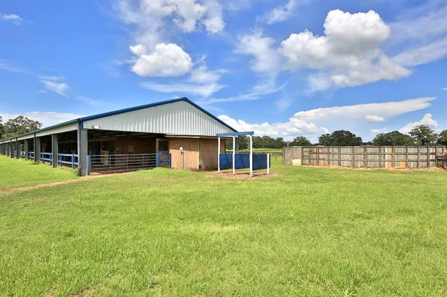a backyard of a house with a yard