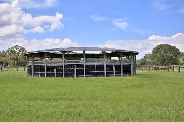an aerial view of a house having yard