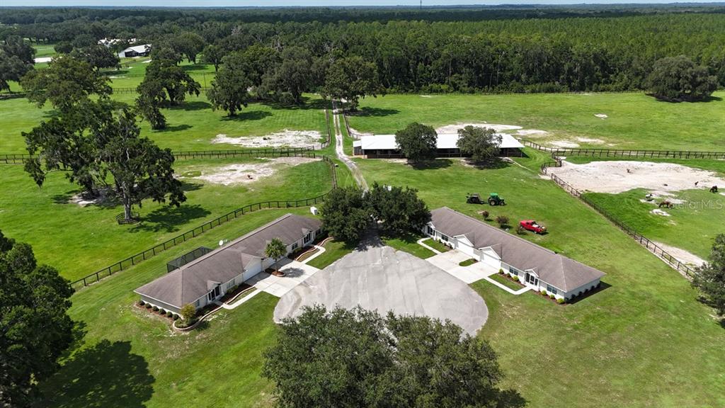 12219 Southwest 26th Street Ocala, FL 34481 - Photo 46 of 63 an aerial view of a house with yard