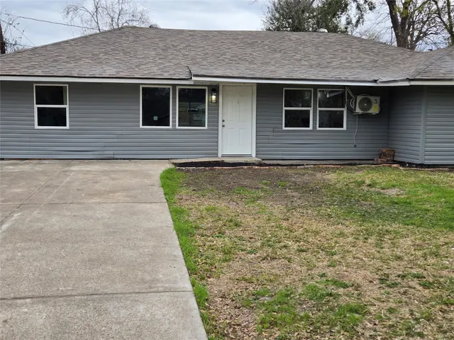 a view of outdoor space yard and front view of a house