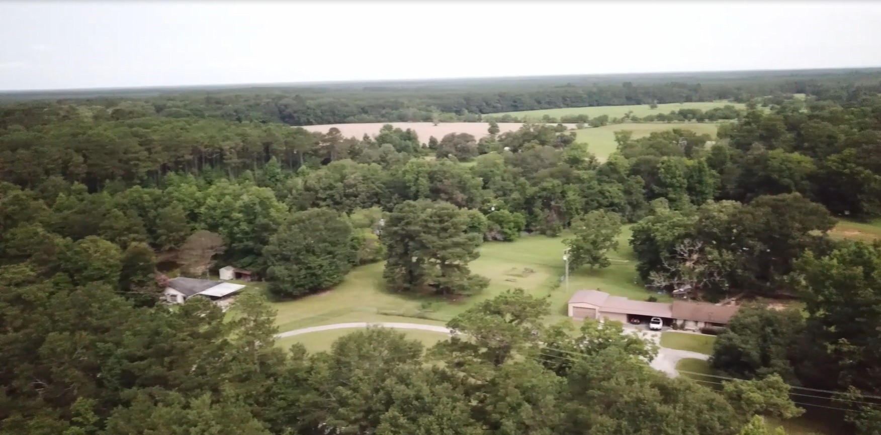 0 Fm-787 Cleveland, TX 77327 - Photo 4 of 9 an aerial view of residential house with outdoor space and trees all around