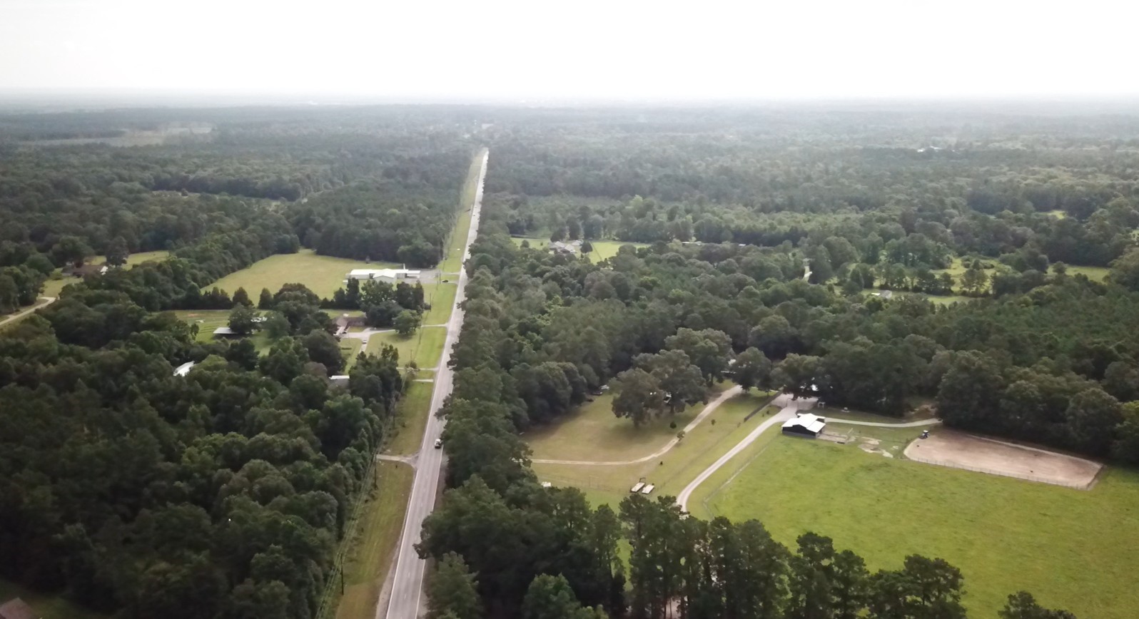 0 Fm-787 Cleveland, TX 77327 - Photo 5 of 9 an aerial view of residential houses with outdoor space