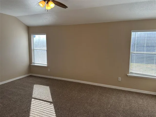a view of a livingroom with a staircase