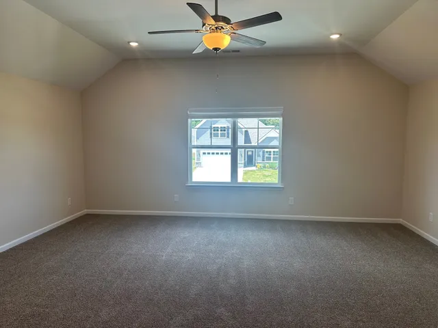 an empty room that has a window