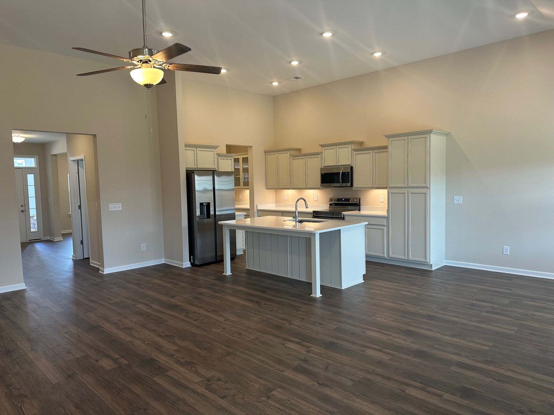 7017 Sully Court Fairview, TN 37062 - Photo 4 of 16 a view of kitchen with cabinets microwave and refrigerator