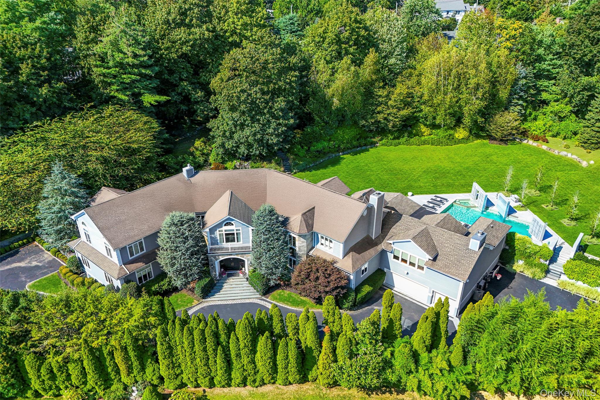 23 Pheasant Drive Rye, NY 10580 - Photo 3 of 30 Surrounded by mature landscaping
