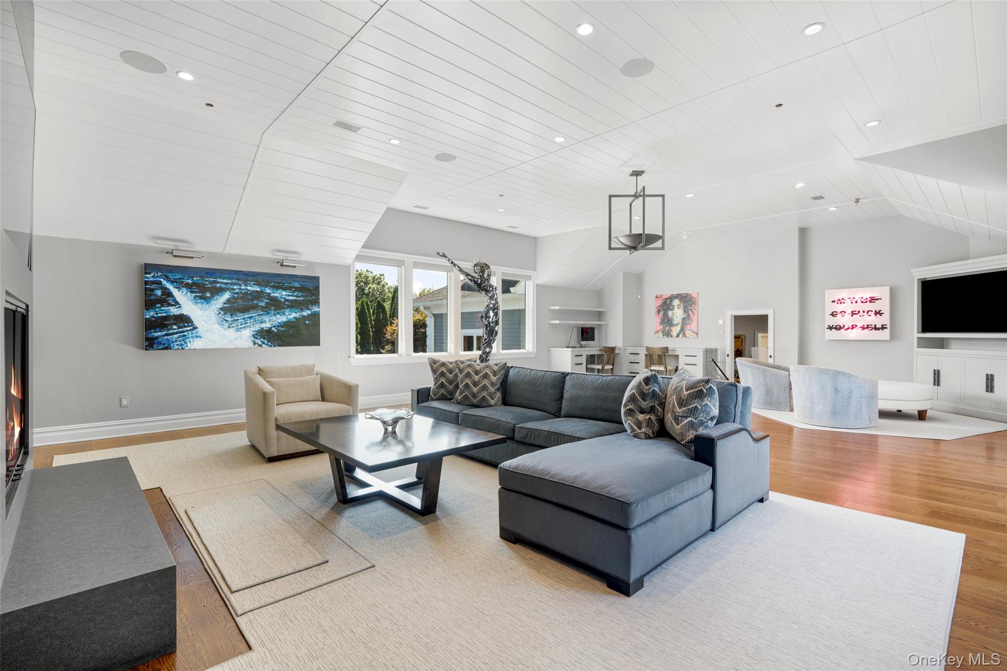 23 Pheasant Drive Rye, NY 10580 - Photo 6 of 35 Light and bright, this generous room provides space for multiple seating and entertainment areas.