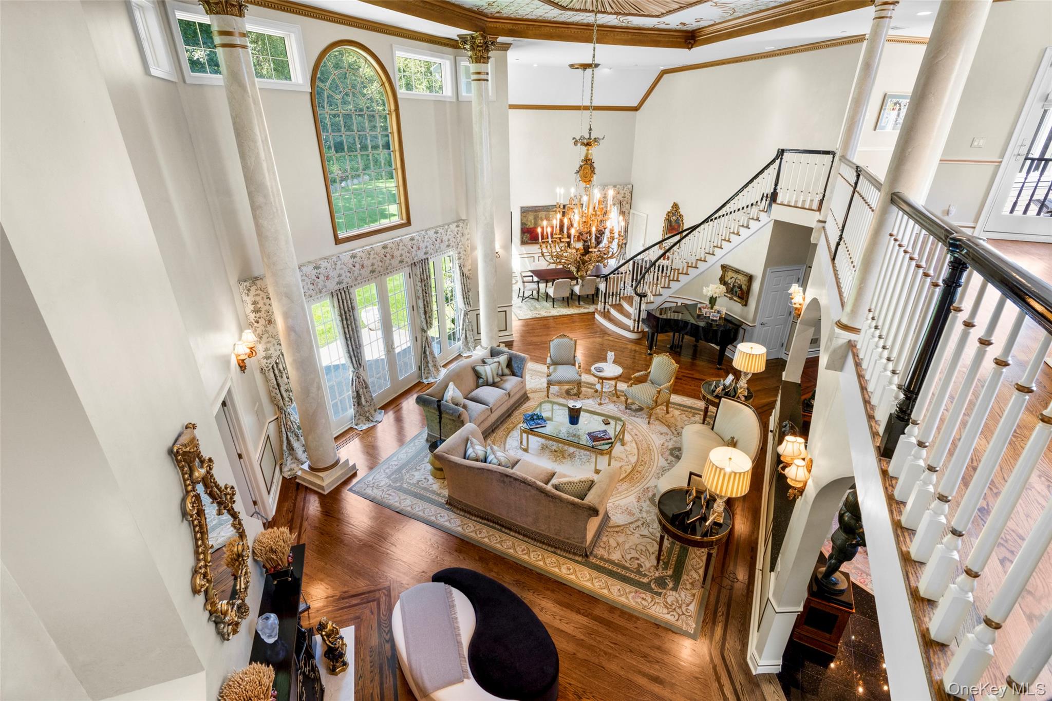 23 Pheasant Drive Rye, NY 10580 - Photo 10 of 35 The scale and grandeur of the great room is captured beautifully from the second floor balcony