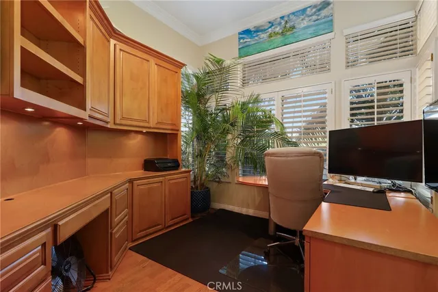 a room with a chair and a stove top oven