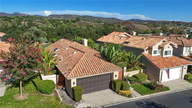 an aerial view of a city with lots of residential buildings