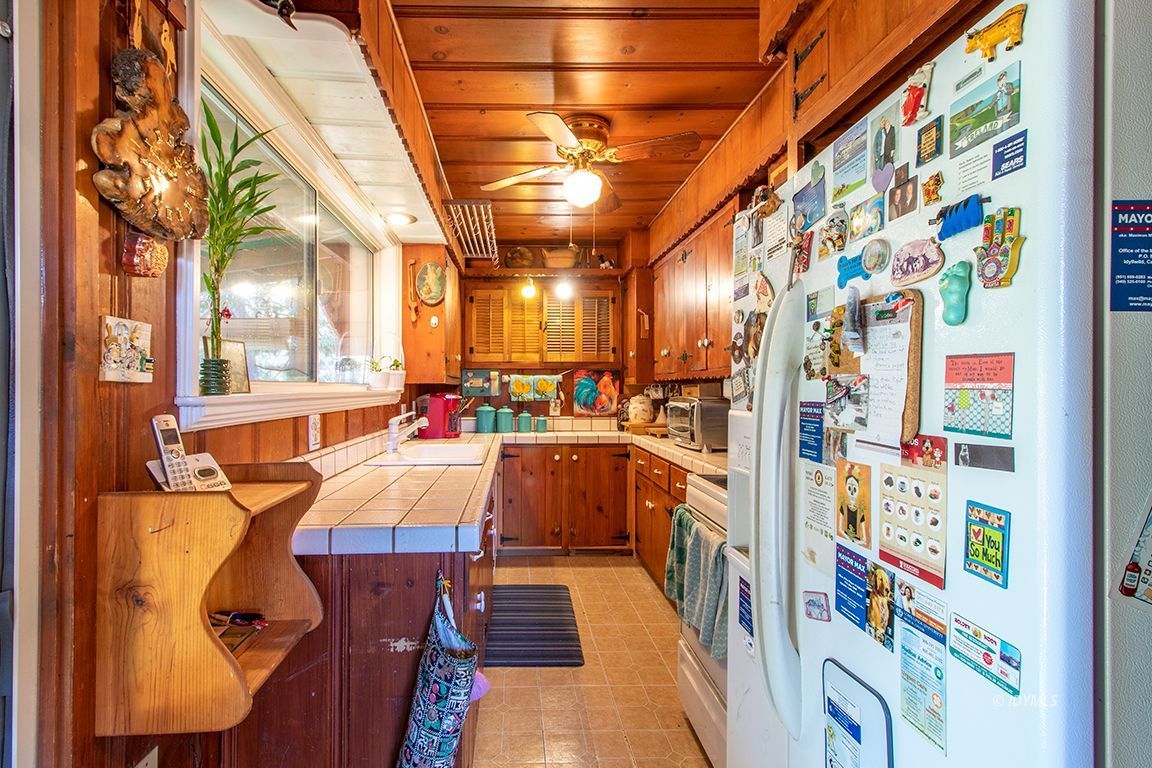 53475 Double View Drive Idyllwild, CA 92549 - Photo 15 of 51 Kitchen with knotty pine cabinets