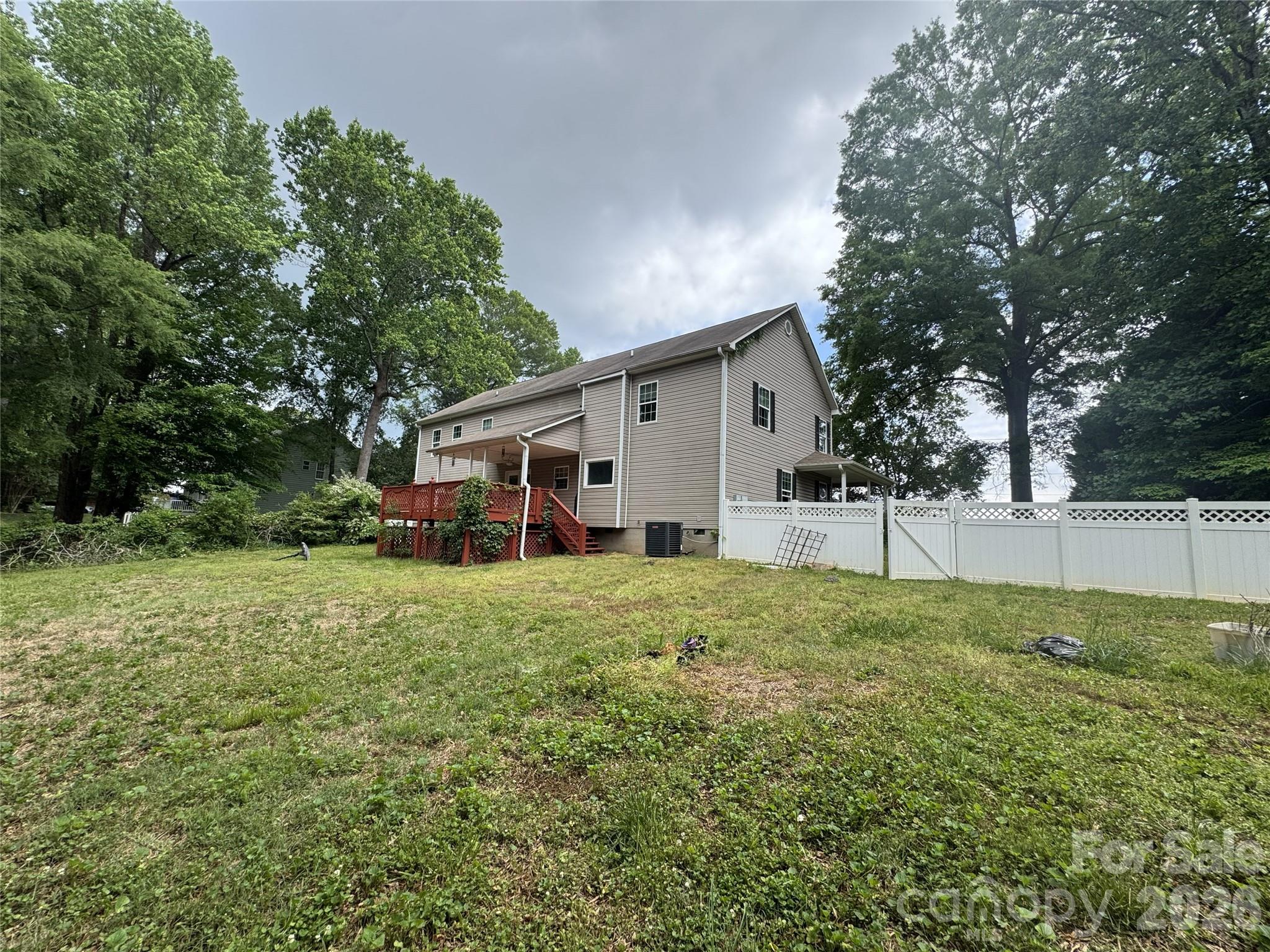 8441 Shelley Mullis Road Fort Mill, SC 29707 - Photo 20 of 23 a view of a house with backyard