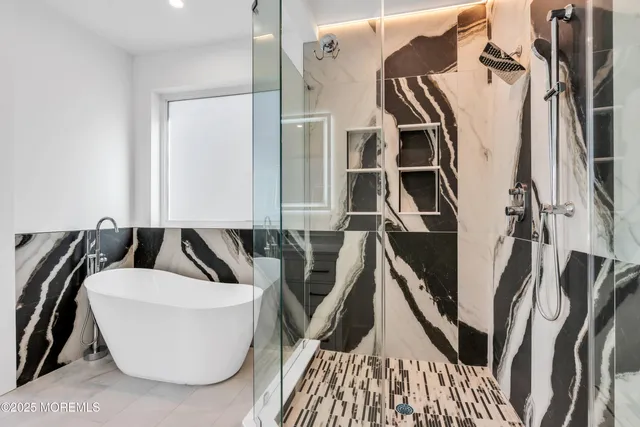 a view of a garage filled with furniture and a chandelier