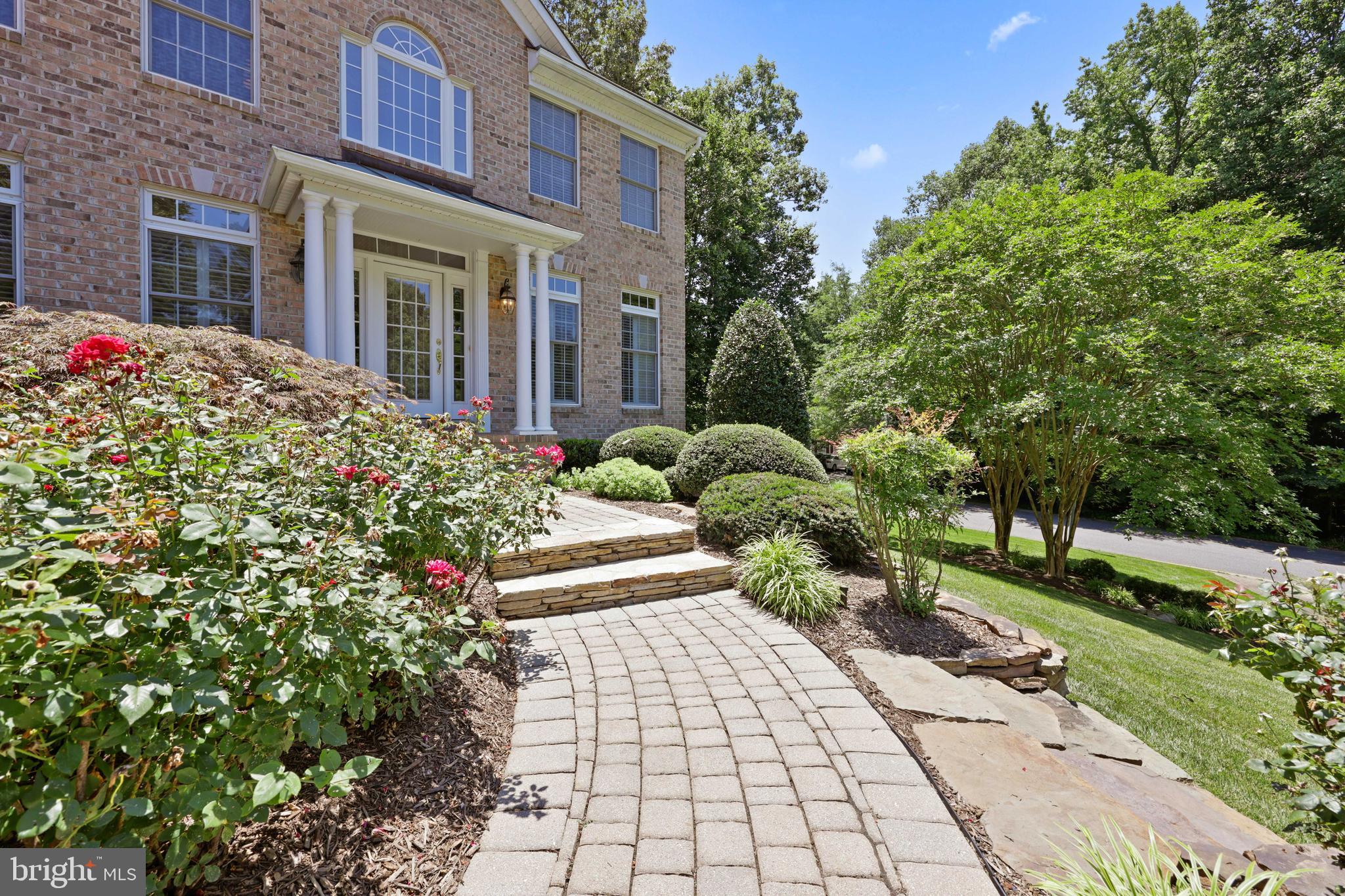 Beautiful maintain entryway with brick pavers
