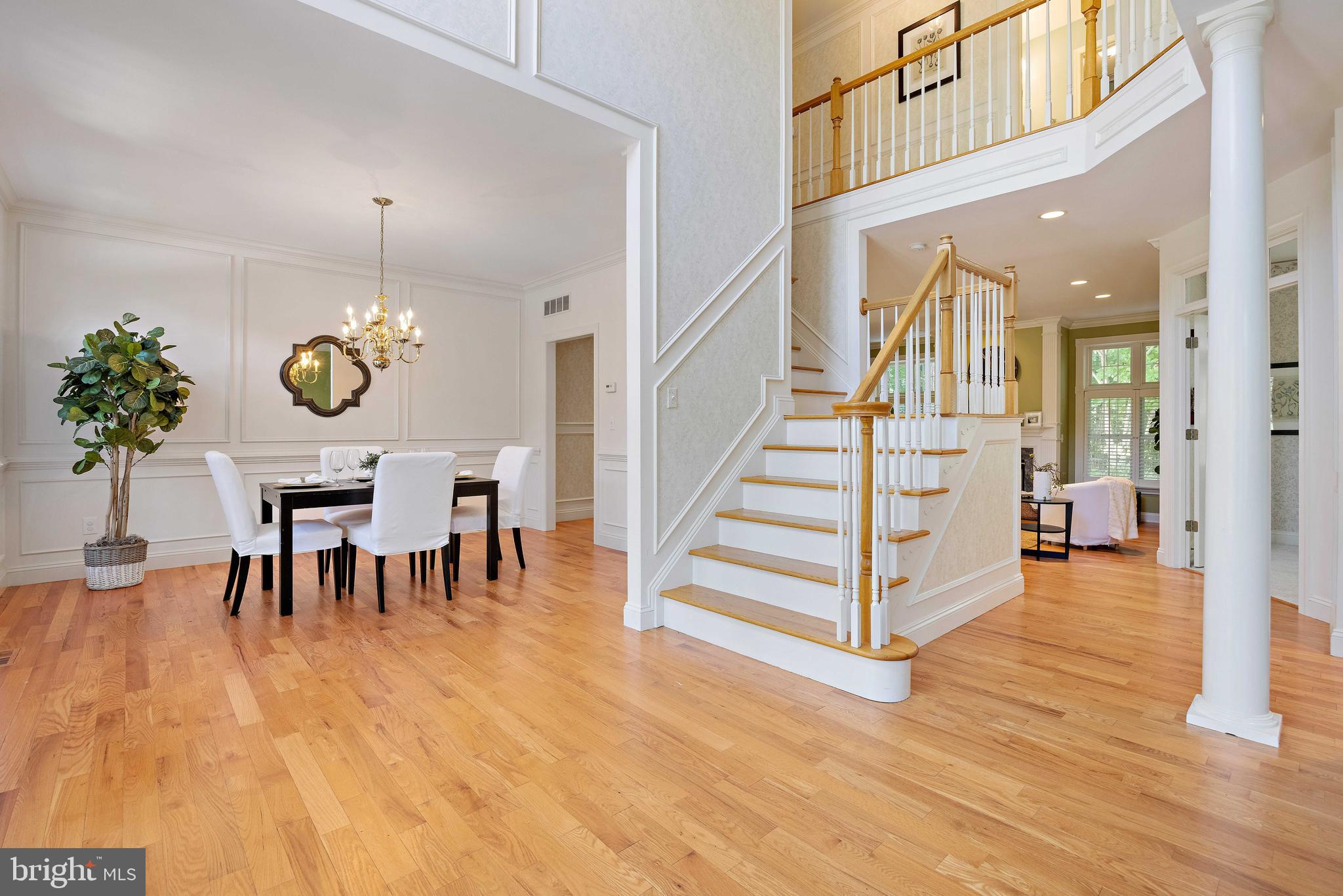 Stairs with view of dinning room