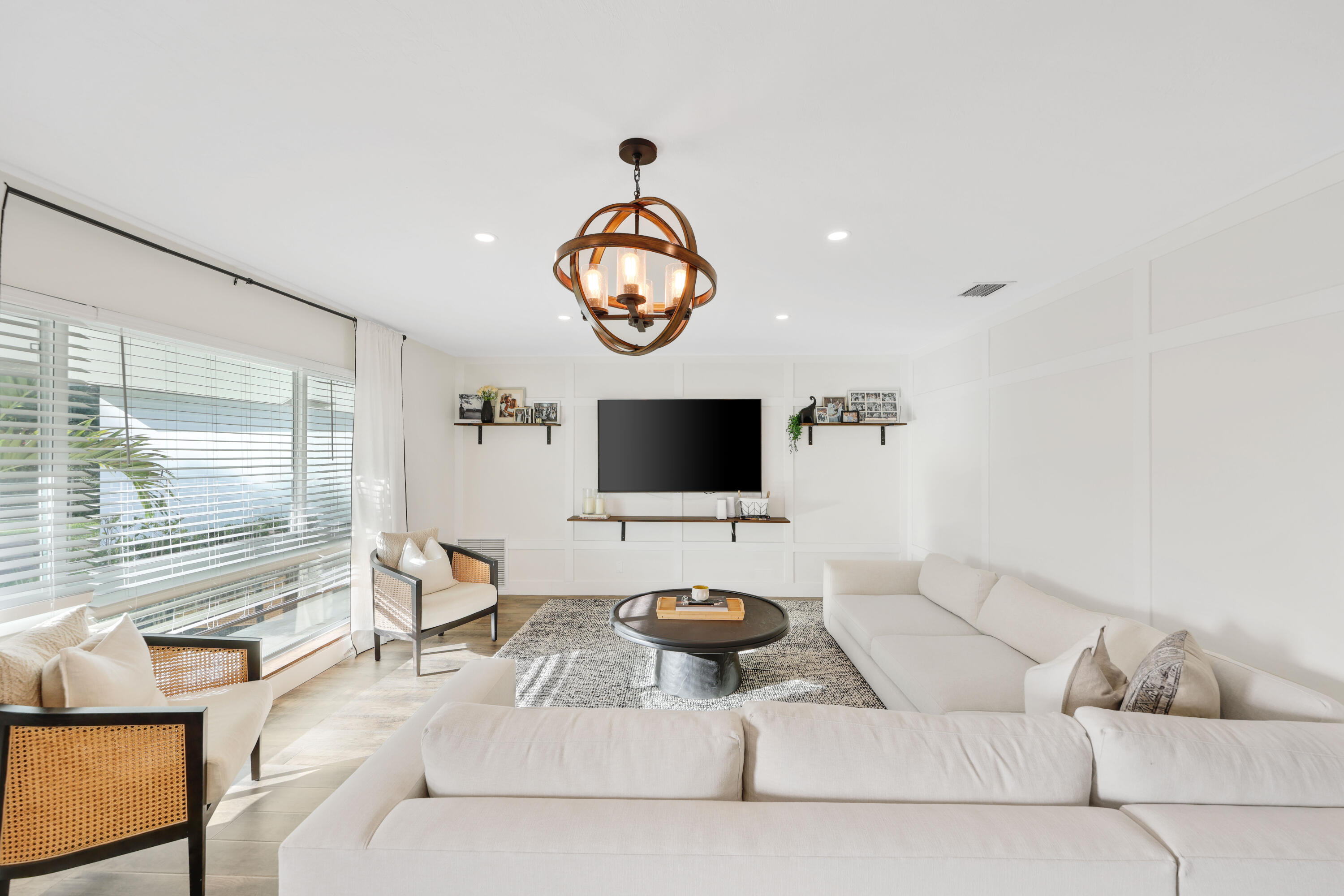632 East Conference Drive Boca Raton, FL 33486 - Photo 5 of 49 a living room with furniture and a flat screen tv