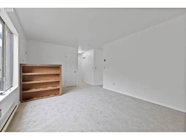 a view of room and an empty room