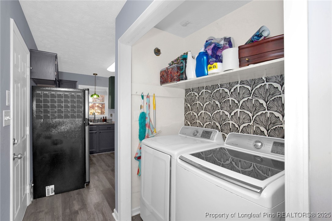 529 Old Farm Road Fayetteville, NC 28314 - Photo 18 of 35 a kitchen with a stove and a refrigerator