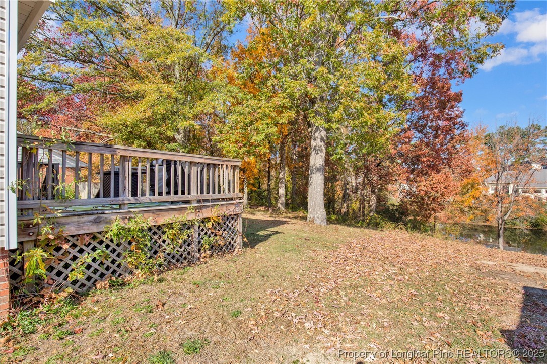 529 Old Farm Road Fayetteville, NC 28314 - Photo 29 of 35 a view of backyard with wooden fence