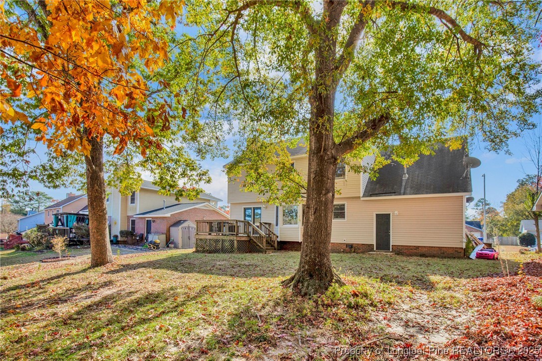 529 Old Farm Road Fayetteville, NC 28314 - Photo 31 of 35 a view of a house with a yard and large tree