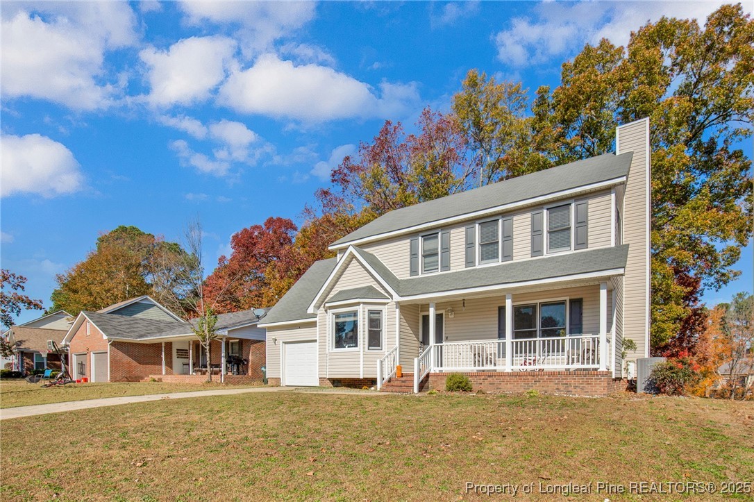 529 Old Farm Road Fayetteville, NC 28314 - Photo 34 of 35 a front view of a house with a garden