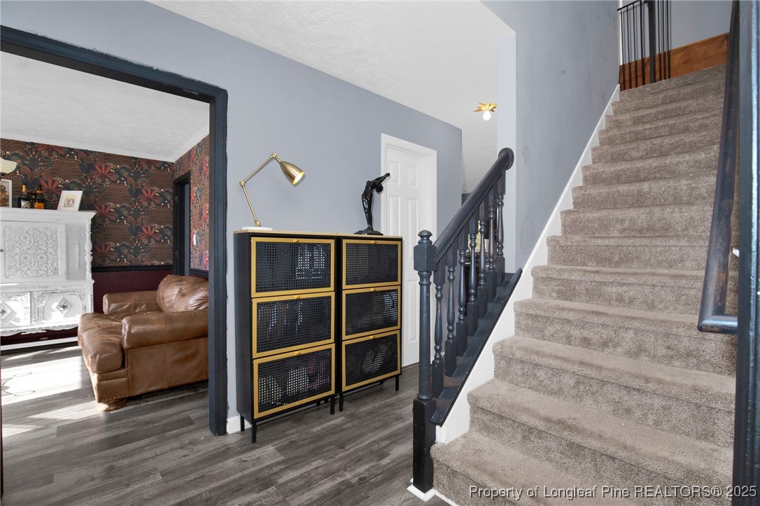 529 Old Farm Road Fayetteville, NC 28314 - Photo 6 of 35 a view of a livingroom with furniture and stairs
