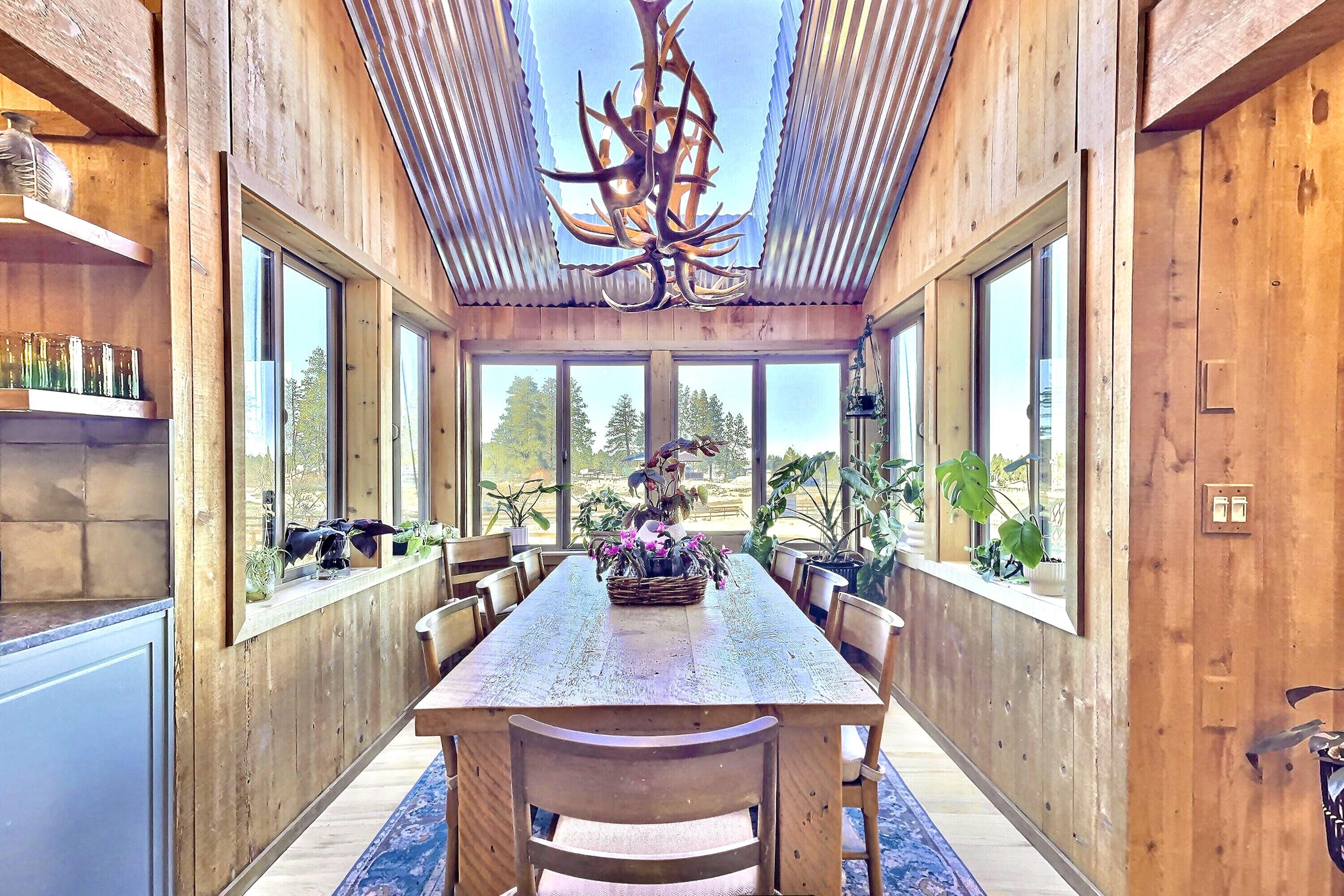 60359 Arnold Market Road Bend, OR 97702 - Photo 14 of 64 reclaimed wood dining table and mid-century chairs with custom chandelier