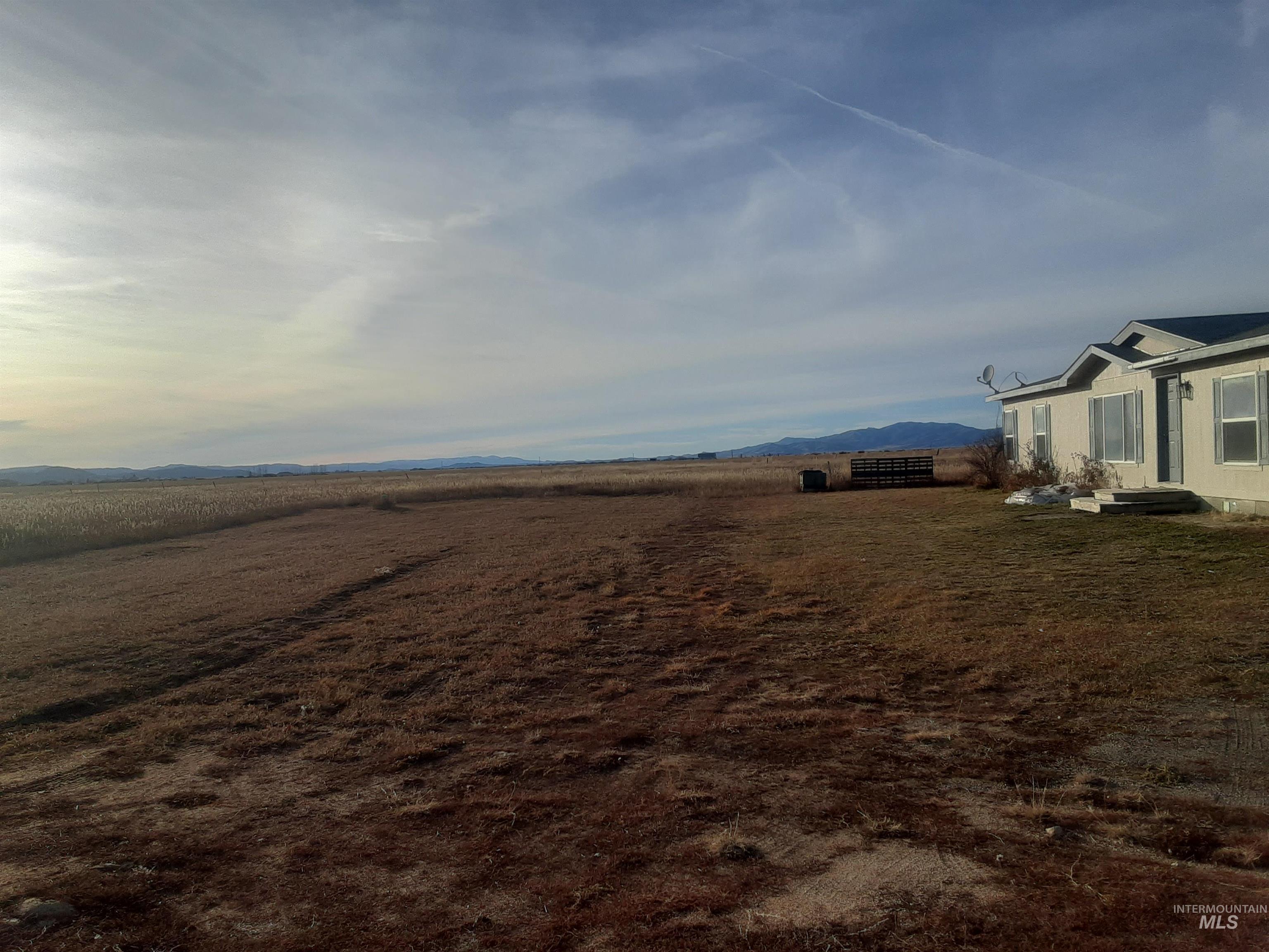 501 Timber Avenue Fairfield, ID 83327 - Photo 26 of 27 View of yard featuring a mountain view and a view of rural / pastoral area