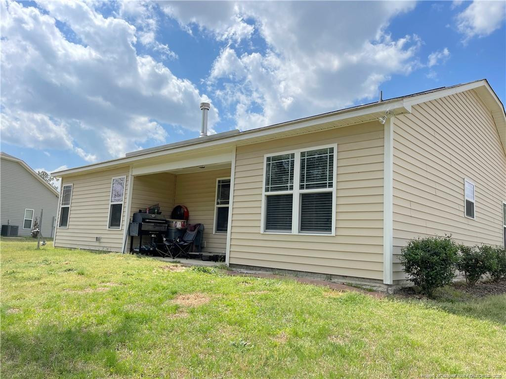 178 Angel Oak Drive Bunnlevel, NC 28323 - Photo 15 of 15 a view of a house with yard and sitting area