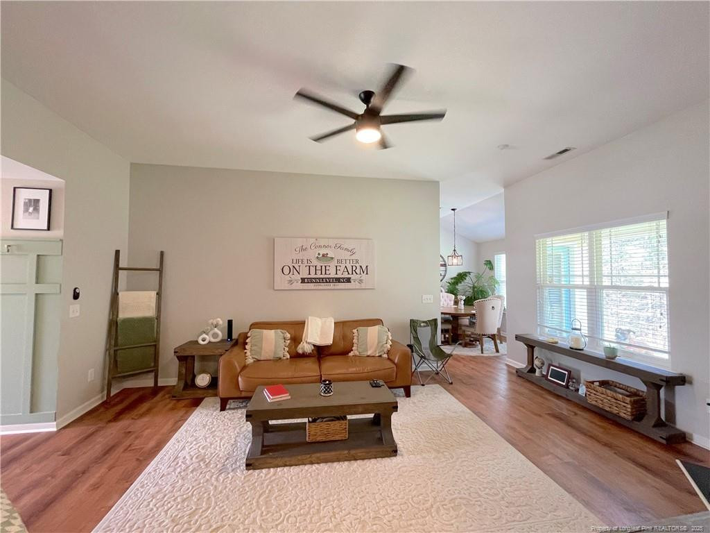 178 Angel Oak Drive Bunnlevel, NC 28323 - Photo 4 of 15 a living room with furniture window and wooden floor