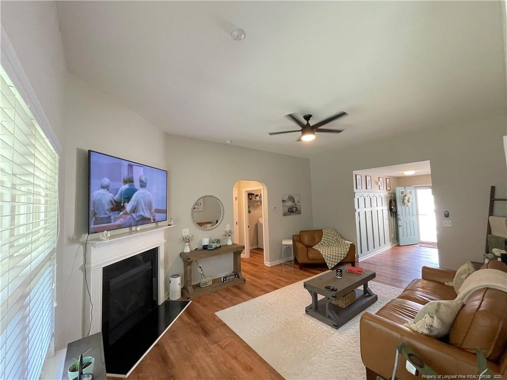178 Angel Oak Drive Bunnlevel, NC 28323 - Photo 5 of 15 a living room with furniture and a fireplace