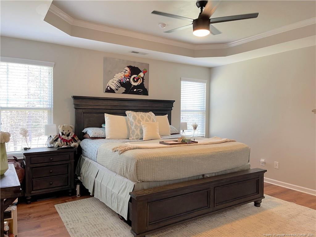 178 Angel Oak Drive Bunnlevel, NC 28323 - Photo 8 of 15 a bedroom with a bed and window