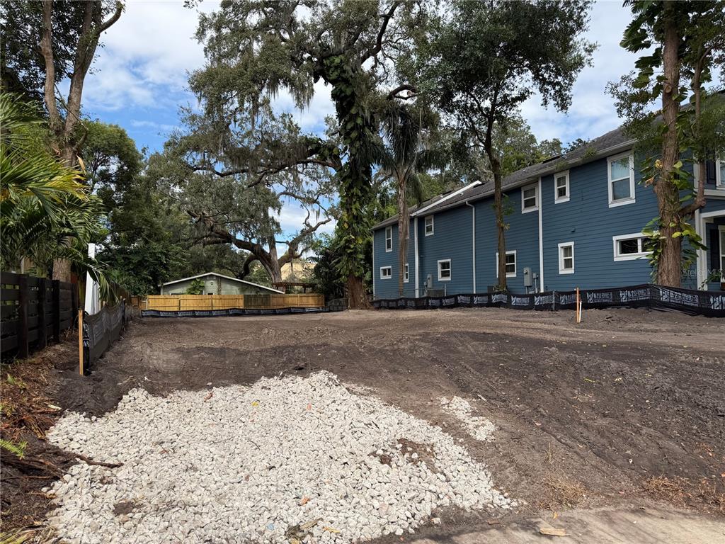 1105 Elmwood Street Orlando, FL 32801 - Photo 2 of 12 a front view of a house with a yard covered in snow