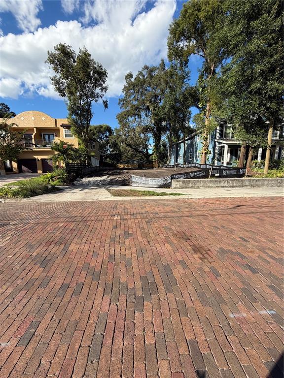 1105 Elmwood Street Orlando, FL 32801 - Photo 8 of 12 a view of a town with buildings and trees