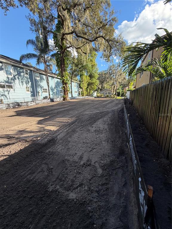 1105 Elmwood Street Orlando, FL 32801 - Photo 9 of 12 a view of a yard with a large tree