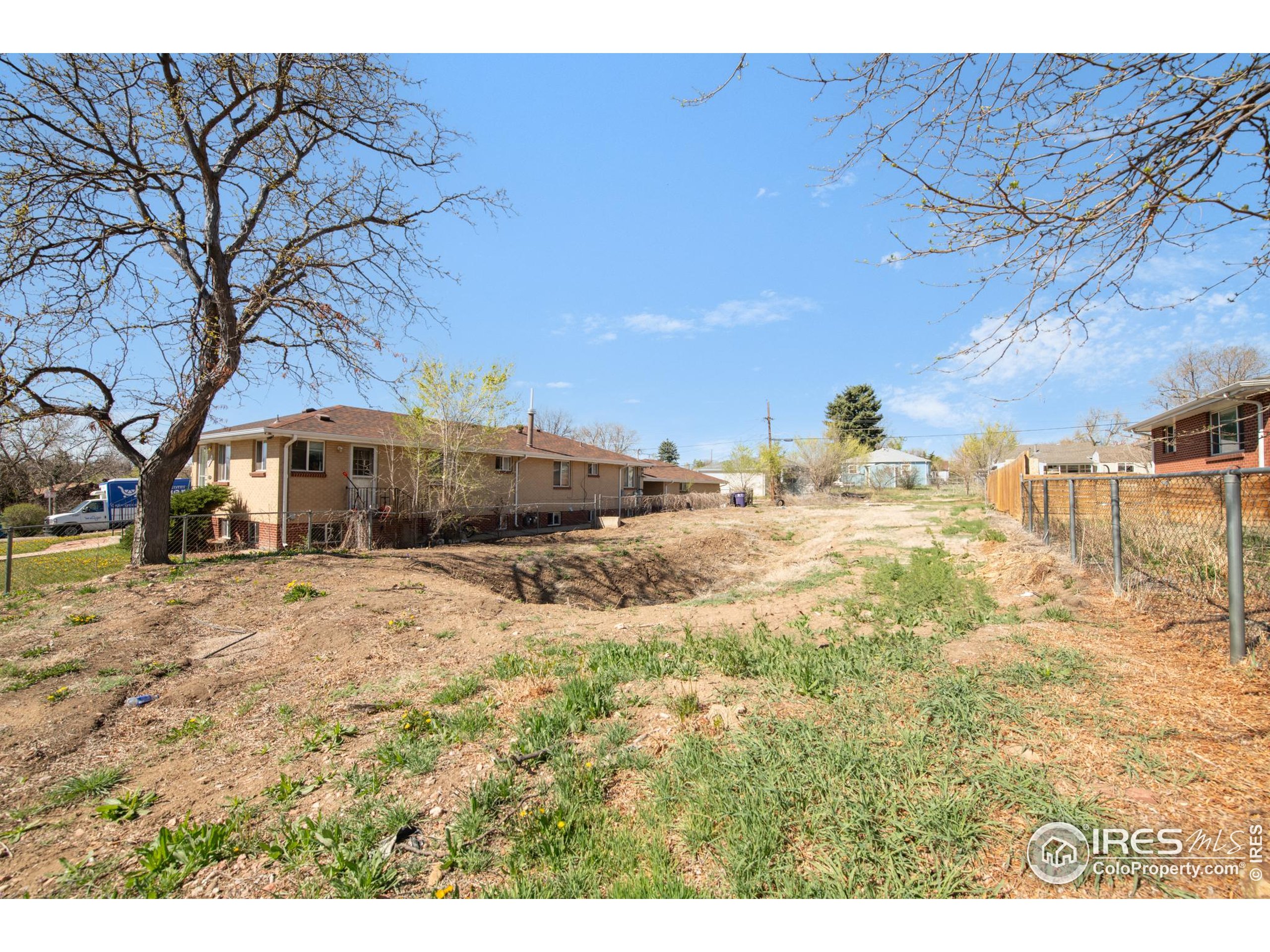909 Wolff Street Denver, CO 80204 - Photo 11 of 15 a view of road with large trees